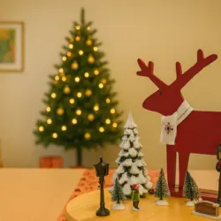 Weihnachtlich dekorierter Ruheraum der Tagespflege Palisadenstraße mit Weihnachtsbaum und Tischarrangement